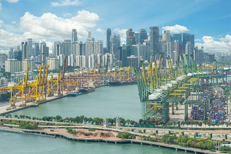 Port Singapore terminals with city skyline