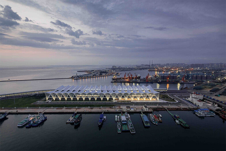 Qingdao Port, near the cruise ship terminal, far away is the cargo port