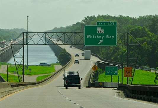 Traffic sign for Manchac Swamp Bridge